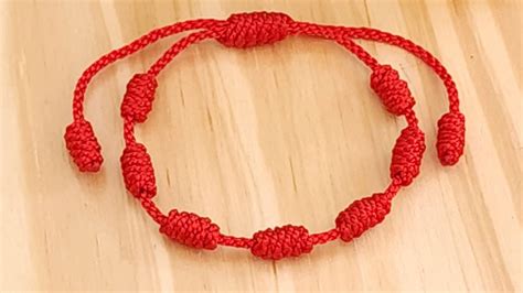 pulsera roja de los 7 nudos|La pulsera roja de 7 nudos significado y colocación。